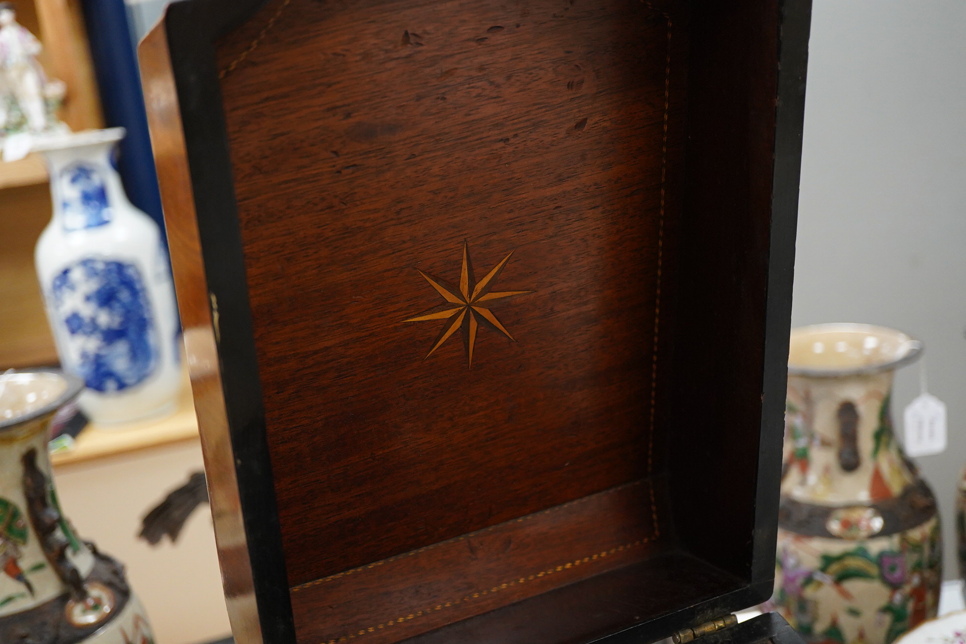A George III inlaid knife box, converted to a decanter box, fitted with three glass decanters with enamelled labels, 39cm high